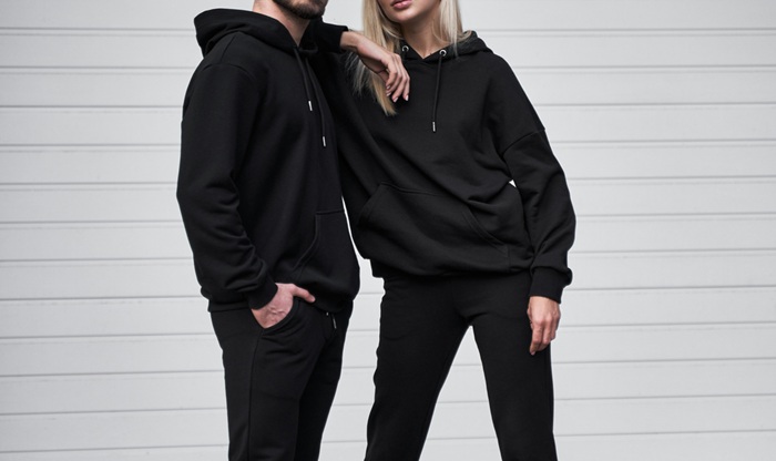 Woman,And,Man,Wear,Black,Hoodie,Without,A,Logo.,No
